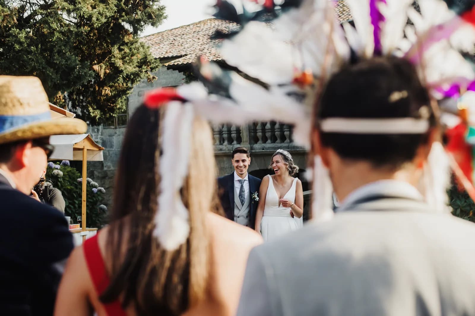 Wedding couple walking together outside their reception
